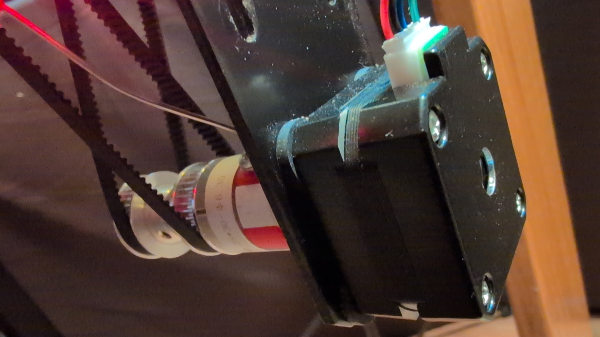 Motor mounted with coupling and dual belts